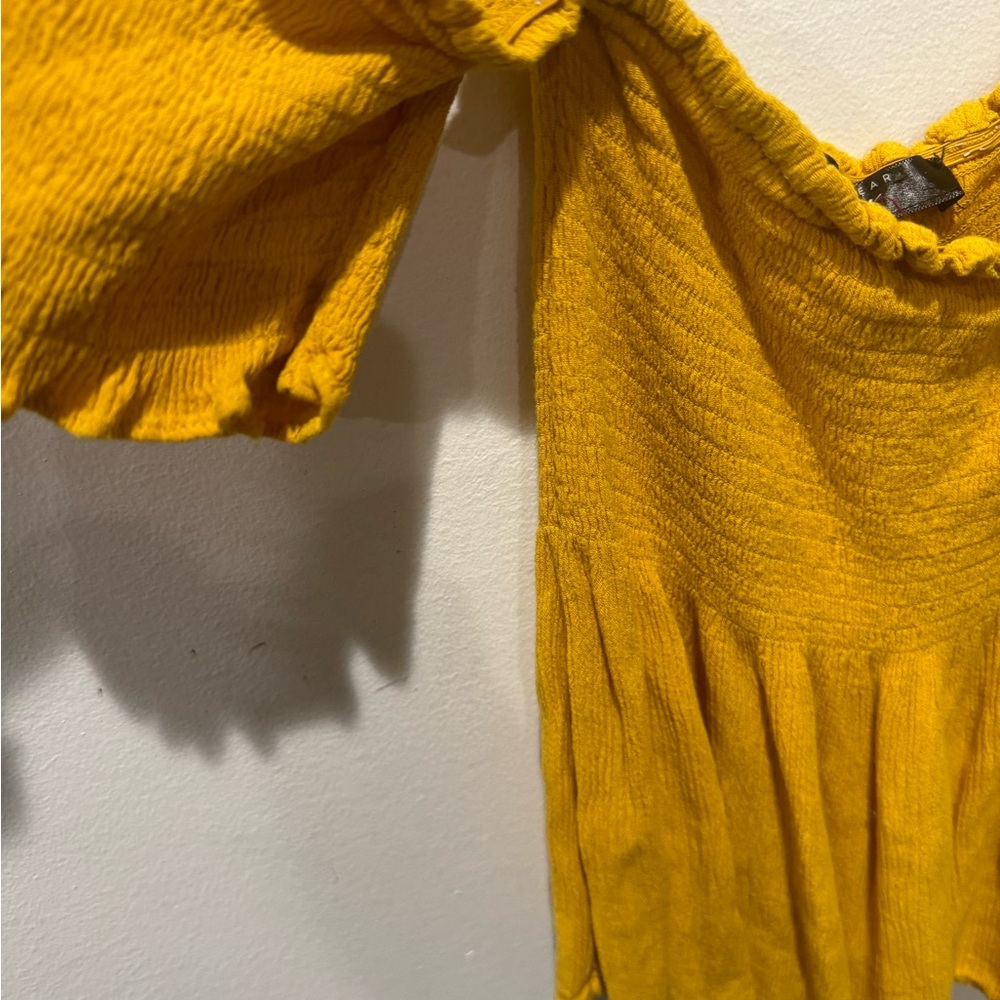 2/$20 Streetwear Society Mustard Ruffled smocked off the shoulder top - Picture 6 of 8